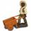 Dekorations - Figur Junge mit Hut schiebt Holz - Schubkarre